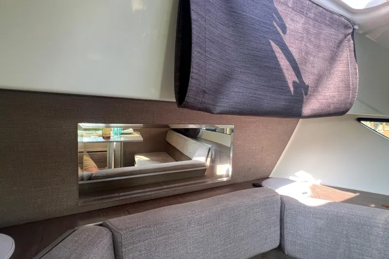 Slide: The Image of Interior of 2024 Beneteau Flyer 9 SUNdeck, featuring modern seating and stylish decor. - 25