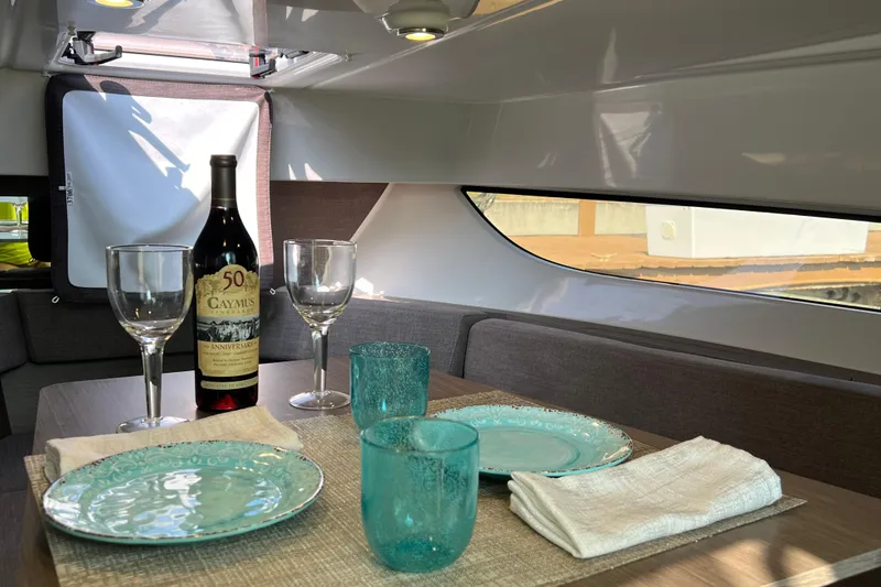 Slide: The Image of Interior of 2024 Beneteau Flyer 9 SUNdeck with elegant dining setup. - 26