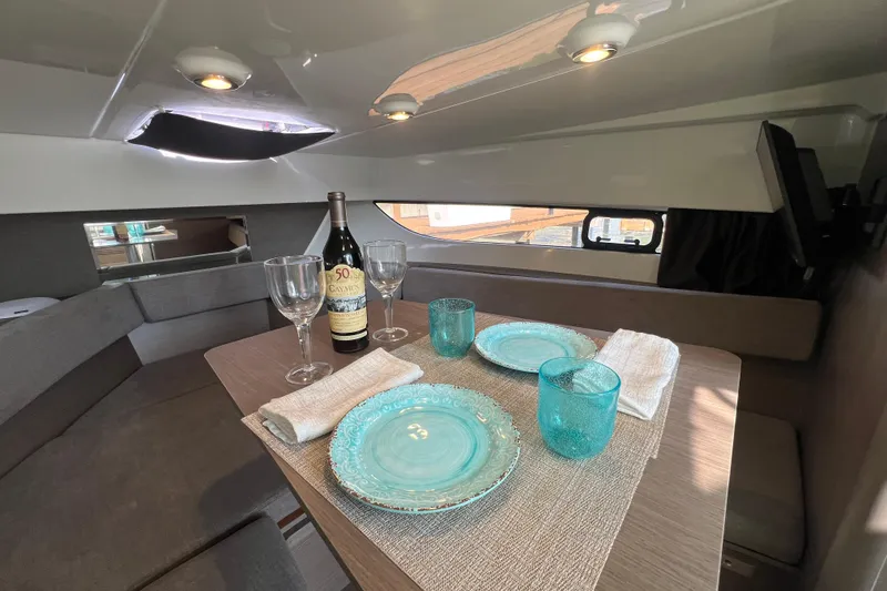 Slide: The Image of Interior of 2024 Beneteau Flyer 9 SUNdeck with elegant dining setup. - 27