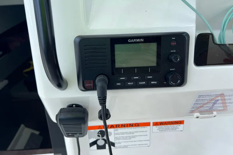 Slide: The Image of Garmin marine radio on 2024 Beneteau Flyer 9 SUNdeck boat dashboard. - 36
