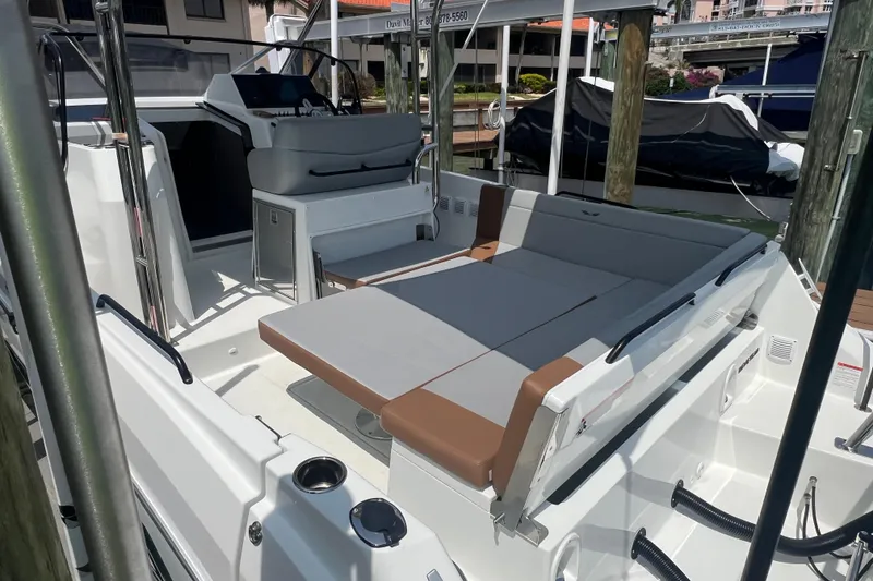 Slide: The Image of 2024 Beneteau Flyer 9 SUNdeck boat interior with seating and helm station. - 8