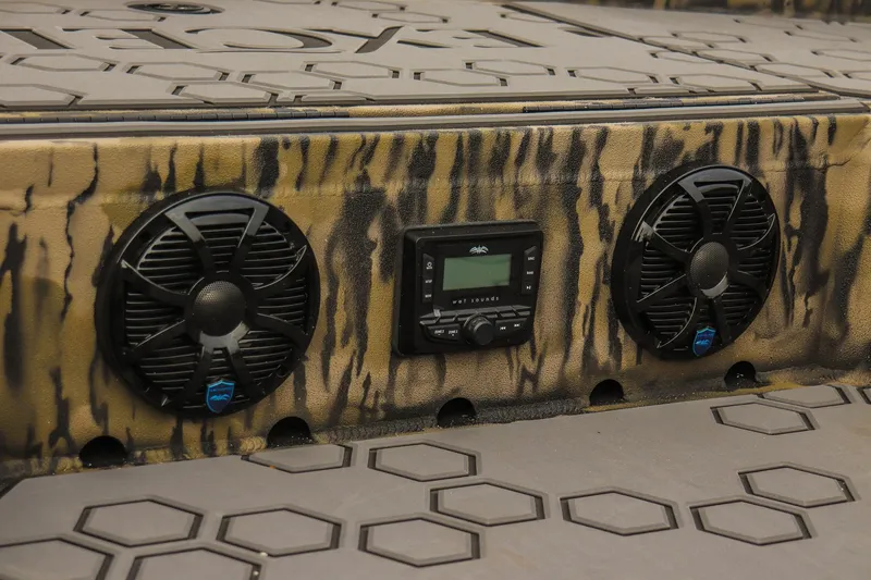 Slide: The Image of 2026 Excel Tomahawk boat audio system with speakers and control panel. - 10