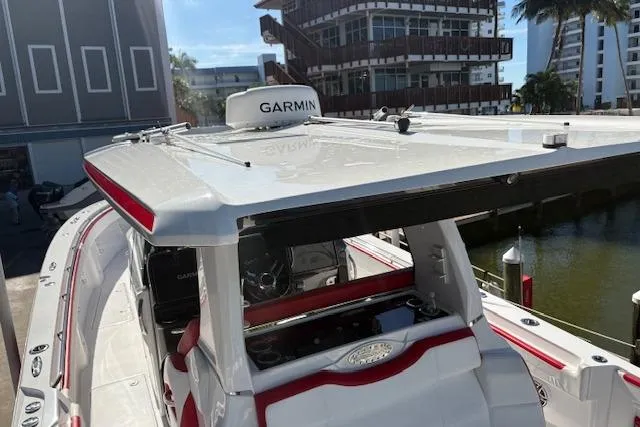 Slide: The Image of 2022 Nor-Tech 452 Super Fish boat storage compartment with white cushioned seating. - 19