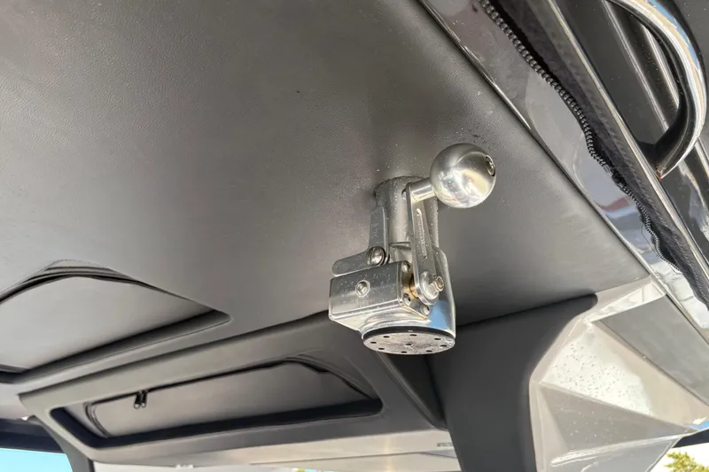 Slide: The Image of 2022 Nor-Tech 452 Super Fish boat with Garmin equipment, docked near modern buildings. - 21