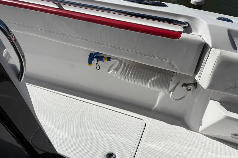 Slide: The Image of 2022 Nor-Tech 452 Super Fish boat interior with red and white detailing. - 25