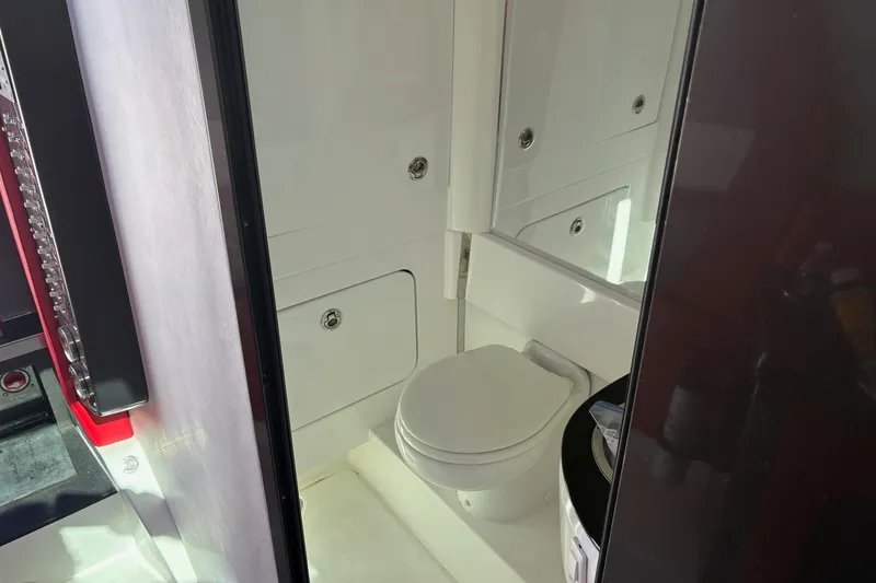 Slide: The Image of 2022 Nor-Tech 452 Super Fish boat with live wells and powerful outboard engines. - 29