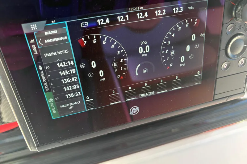 Slide: The Image of Interior of 2022 Nor-Tech 452 Super Fish boat with seating and equipment storage. - 30