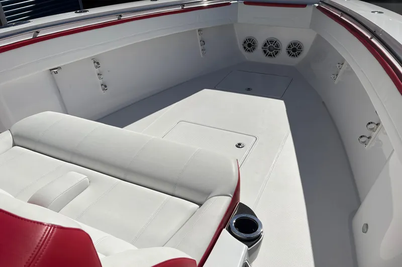 Slide: The Image of 2022 Nor-Tech 452 Super Fish boat with powerful outboard engine, docked in marina. - 5