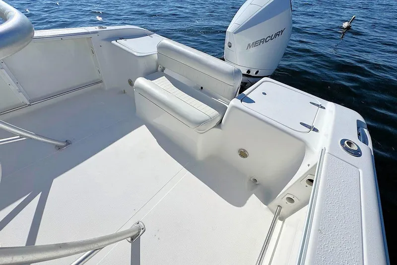 Slide: The Image of 2006 Sea Pro 238 Center Console boat with Mercury engine on calm water. - 7