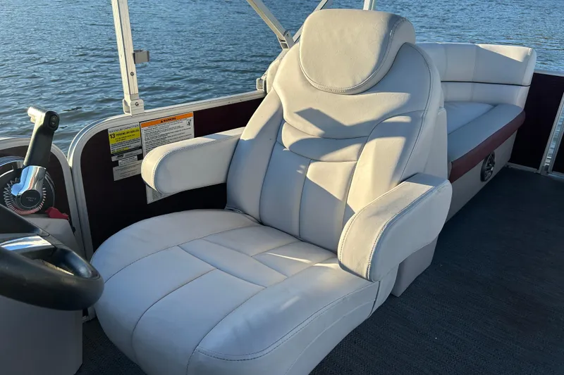 Slide: The Image of Captain's chair on 2023 Godfrey Sweetwater 2286 C pontoon boat, with water view. - 17