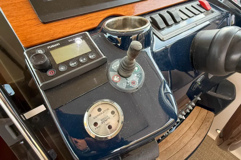 Slide: The Image of Control panel of a 2013 Tiara Yachts 3600 Coronet with joystick and audio system. - 18