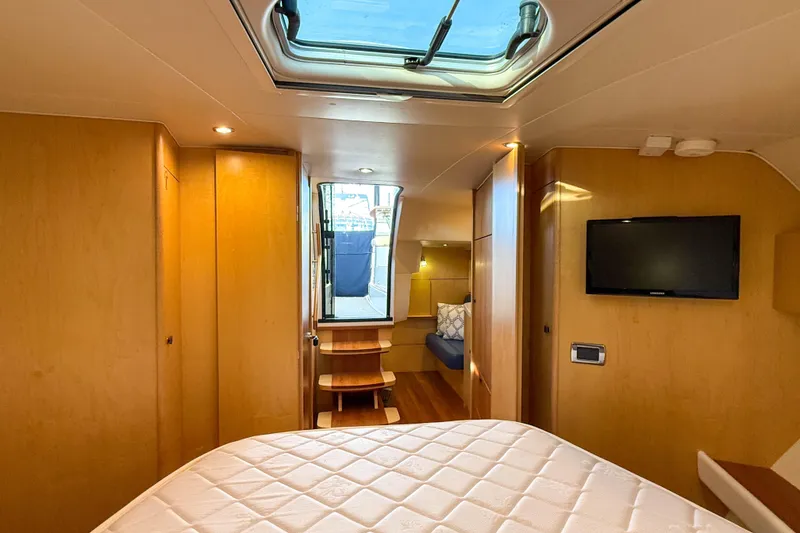 Slide: The Image of Luxurious interior of 2013 Tiara Yachts 3600 Coronet with skylight and modern amenities. - 24