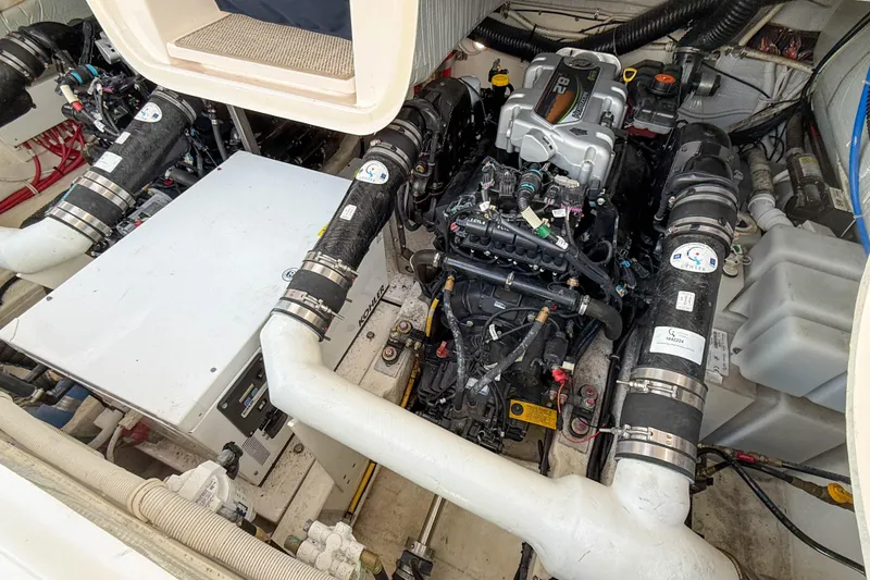 Slide: The Image of Engine compartment of 2013 Tiara Yachts 3600 Coronet, showcasing dual engines and mechanical components. - 40