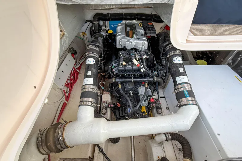 Slide: The Image of Engine compartment of a 2013 Tiara Yachts 3600 Coronet, showcasing detailed mechanical components. - 41