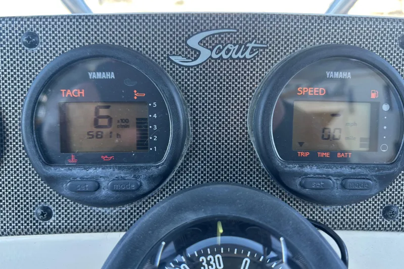 Slide: The Image of Dashboard of a 2004 Scout 235 Sportfish boat with Yamaha gauges. - 20