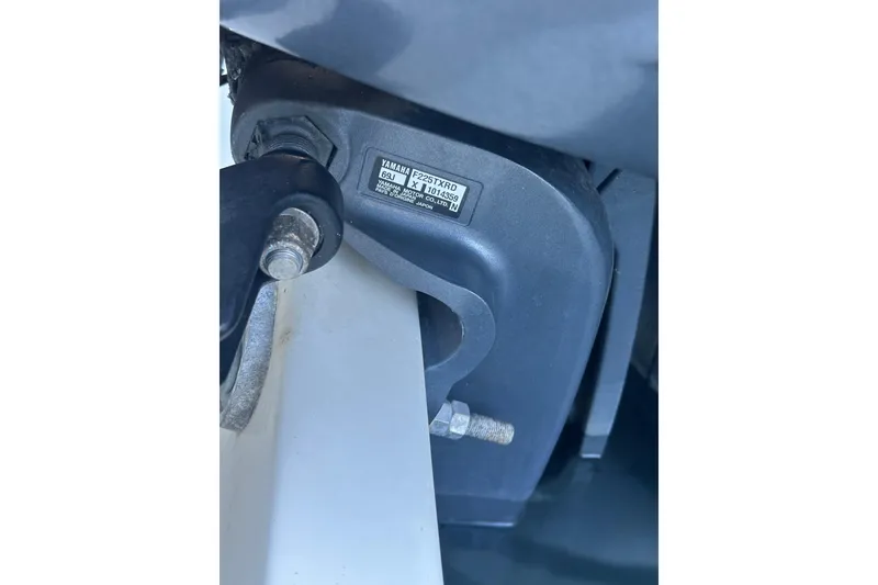 Slide: The Image of Close-up of a Yamaha F225TXR outboard motor on a 2004 Scout 235 Sportfish boat. - 6