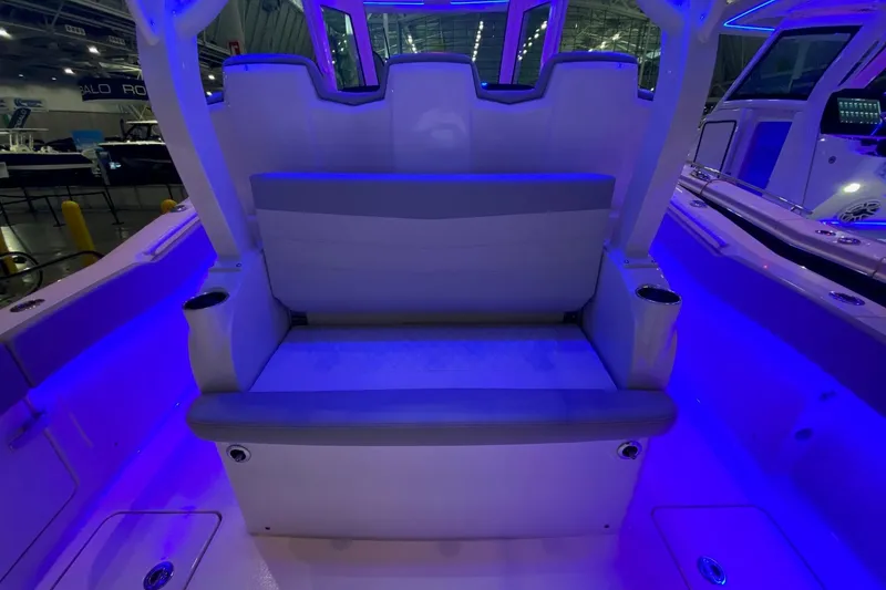Slide: The Image of 2026 Scout 357 LXF boat interior with illuminated seating and modern design. - 12