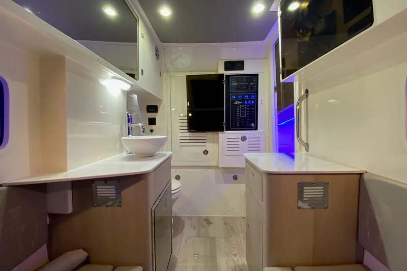 Slide: The Image of Luxurious interior of 2026 Scout 357 LXF boat with modern amenities and sleek design. - 17