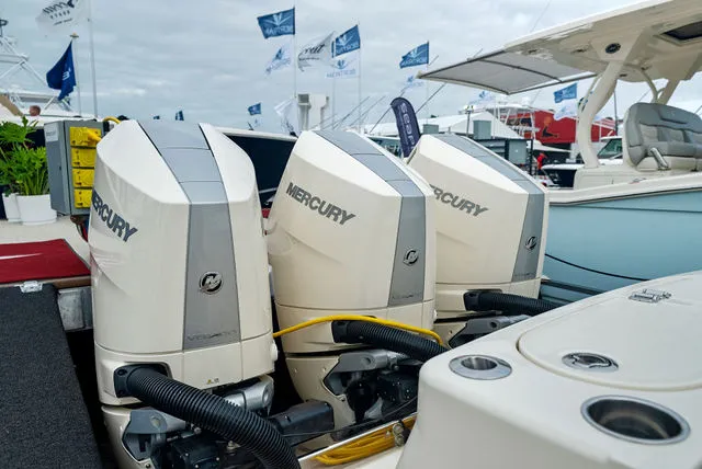 Slide: The Image of 2026 Scout 357 LXF boat compartment with ladder and equipment. - 19