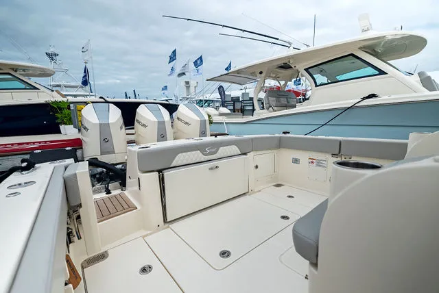 Slide: The Image of Luxurious interior of 2026 Scout 357 LXF boat with modern seating and ambient lighting. - 20