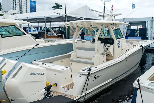 Slide: The Image of Luxurious interior of 2026 Scout 357 LXF boat cabin with modern amenities. - 23