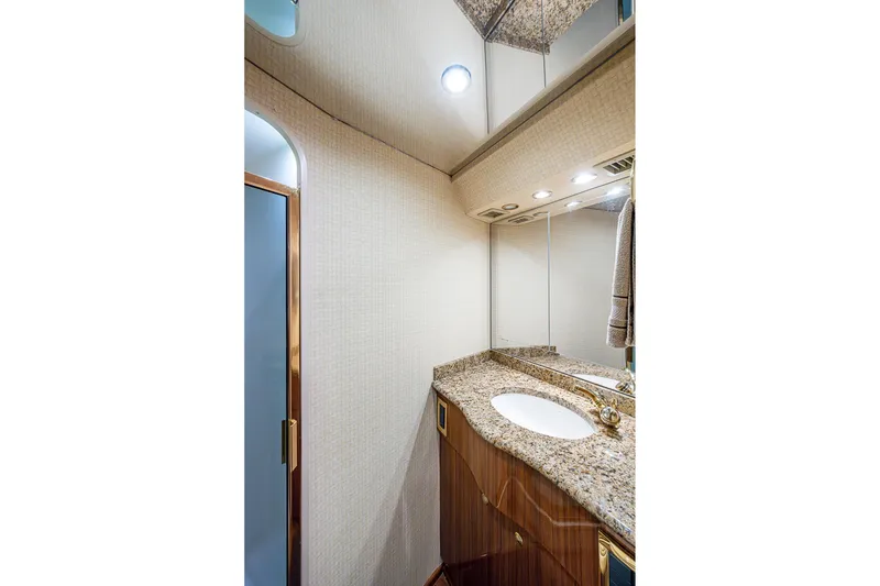 Slide: The Image of Luxurious bathroom in 2007 Viking 64 Convertible yacht with granite countertop. - 22