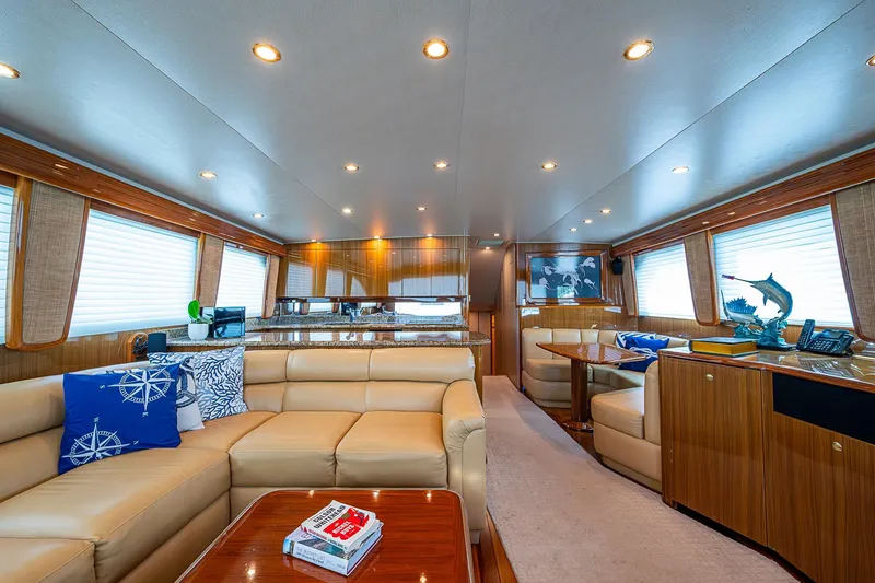 Slide: The Image of Luxurious interior of a 2007 Viking 64 Convertible yacht with elegant seating and decor. - 9