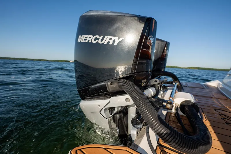 Slide: The Image of 2019 Sea Ray SDX 290 Outboard with Mercury engines on water. - 29