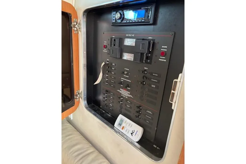 Slide: The Image of Electrical control panel on a 2003 Wellcraft 3300 Coastal boat. - 6