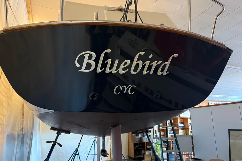 Slide: The Image of 2021 Tartan Fantail sailboat named "Bluebird" in indoor storage. - 9