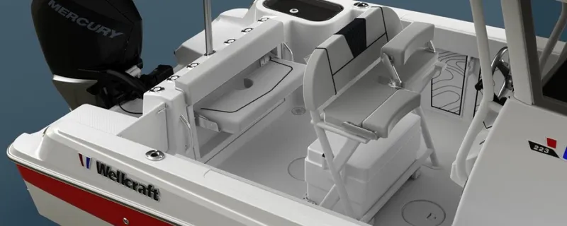 Slide: The Image of 2025 Wellcraft 223 Fisherman boat interior with seating and Mercury engine. - 8