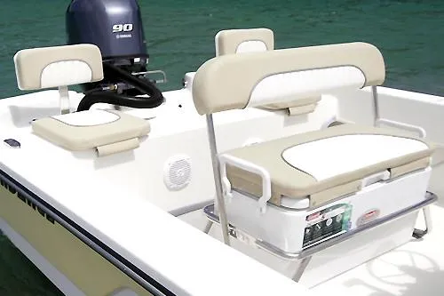 Slide: The Image of Manufacturer Provided Image: Interior seating of 2025 Sundance B20CCR boat with beige cushions. - 8
