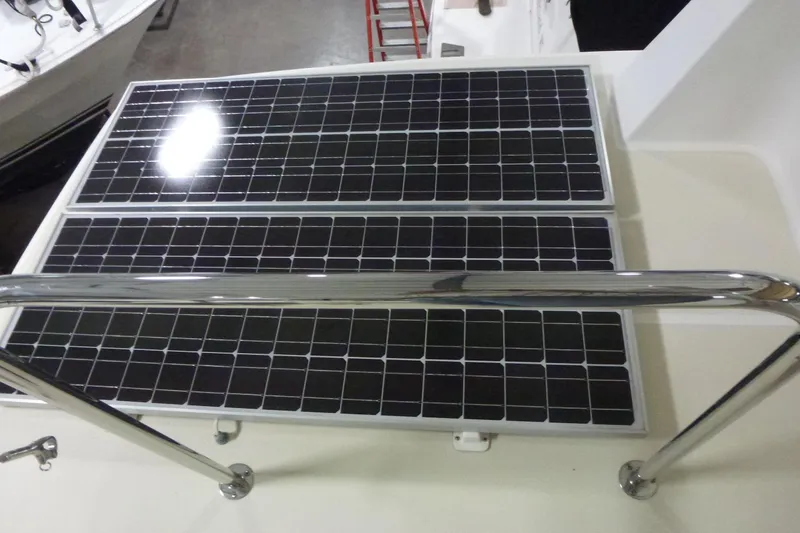 Slide: The Image of Solar panels on a 2009 Maine Cat P-47 boat, viewed from above. - 30