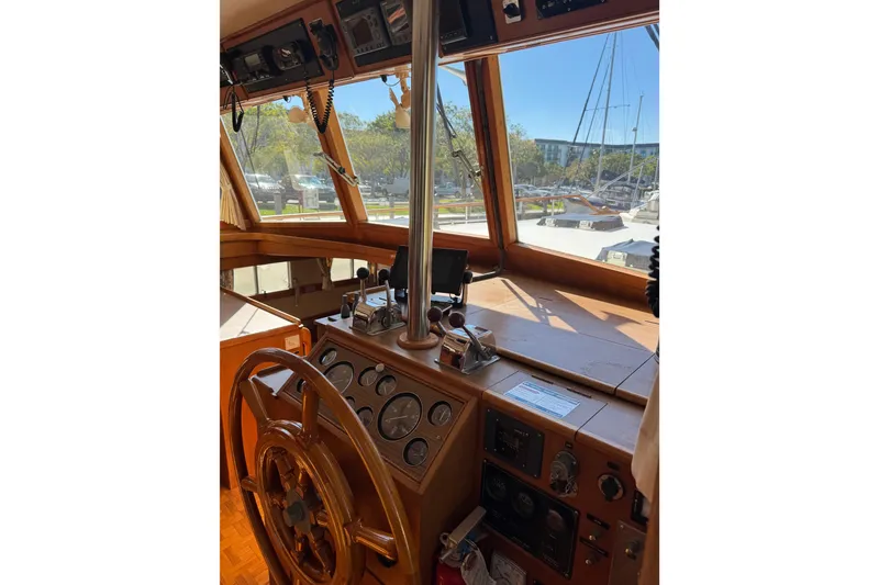 Slide: The Image of Interior view of 1990 Grand Banks 46 Classic yacht, showcasing helm and navigation equipment. - 14