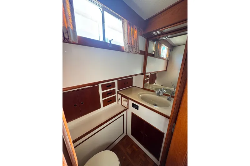 Slide: The Image of Bathroom in 1990 Grand Banks 46 Classic boat. - 48