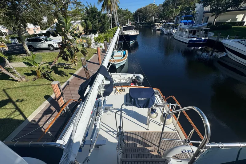 Slide: The Image of Deck view of 1990 Grand Banks 46 Classic yacht with seating and storage. - 55