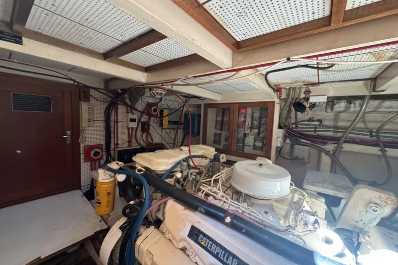 Slide: The Image of Engine room of 1990 Grand Banks 46 Classic with Caterpillar engine. - 61
