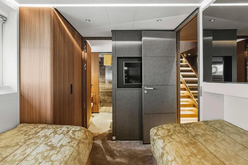 Slide: The Image of Luxurious interior of 2018 Custom Line 120 yacht with modern wood paneling and elegant design. - 107
