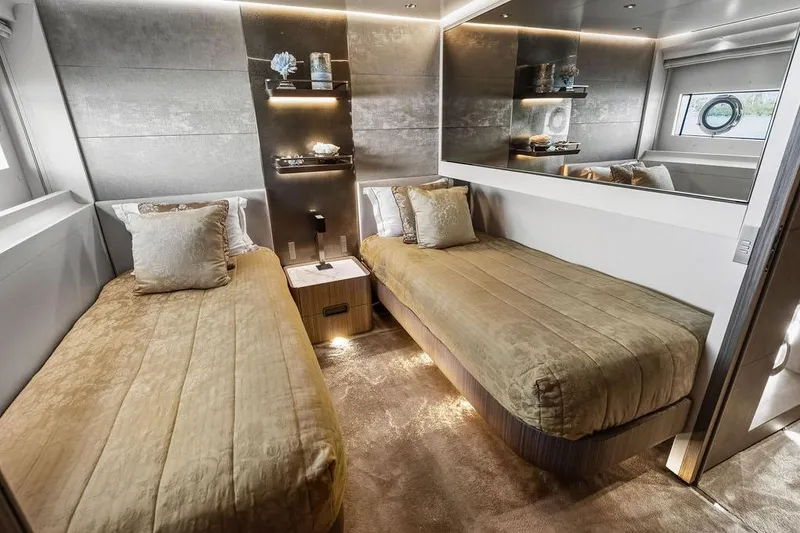 Slide: The Image of Luxurious twin bedroom on 2018 Custom Line 120 yacht, featuring elegant decor and modern amenities. - 112