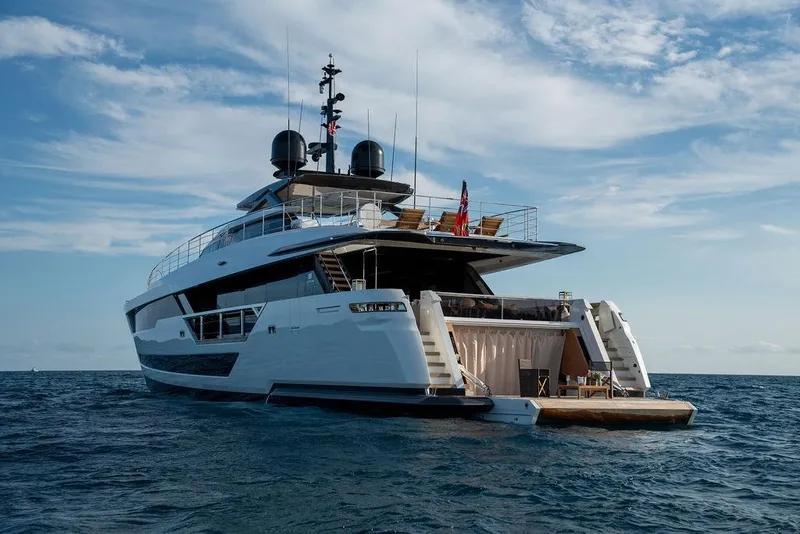 Slide: The Image of Luxurious 2018 Custom Line 120 yacht on open sea under blue sky. - 15