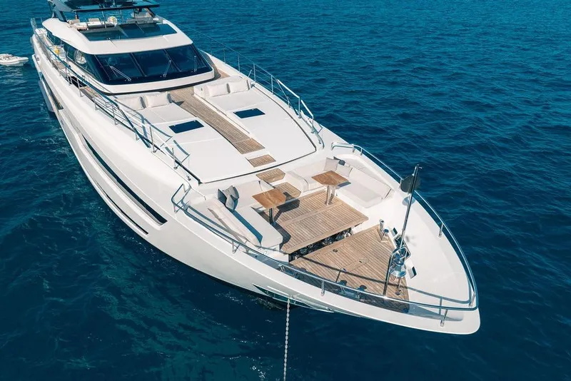 Slide: The Image of Luxurious 2018 Custom Line 120 yacht on open sea, featuring sleek design and spacious deck. - 23