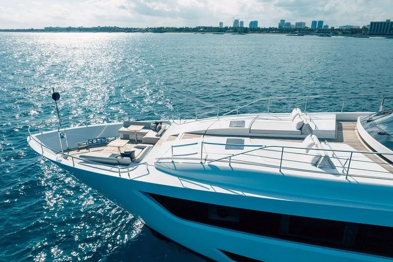 Slide: The Image of Luxurious 2018 Custom Line 120 yacht cruising on serene blue waters. - 24