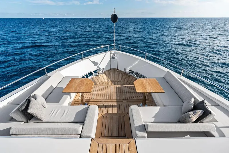 Slide: The Image of Luxurious 2018 Custom Line 120 yacht deck with elegant seating and ocean view. - 26