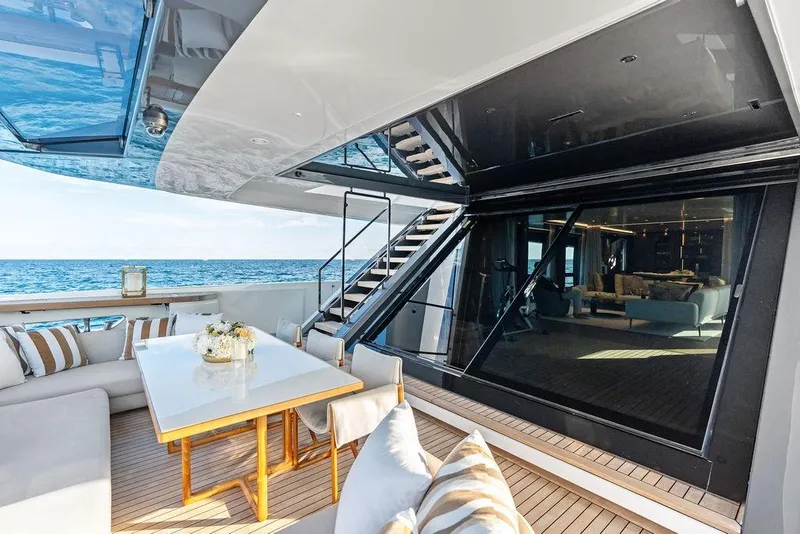 Slide: The Image of Luxurious 2018 Custom Line 120 yacht interior with elegant seating and ocean view. - 33