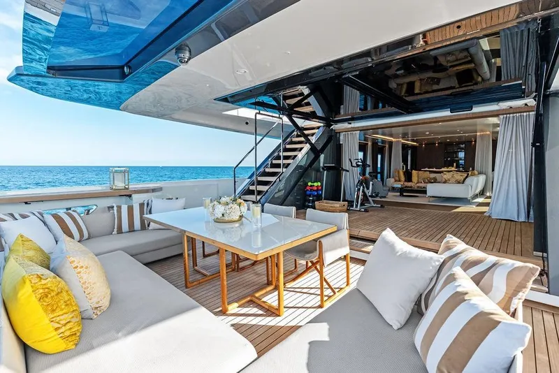 Slide: The Image of Luxurious 2018 Custom Line 120 yacht with elegant outdoor seating and ocean view. - 34