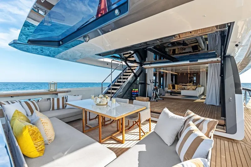 Slide: The Image of Luxurious 2018 Custom Line 120 yacht with elegant outdoor seating and ocean view. - 35