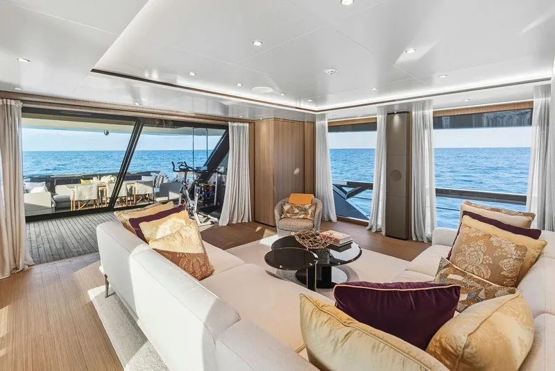 Slide: The Image of Luxurious yacht interior with ocean view, featuring elegant seating and modern decor, Custom Line 120, 2018. - 45