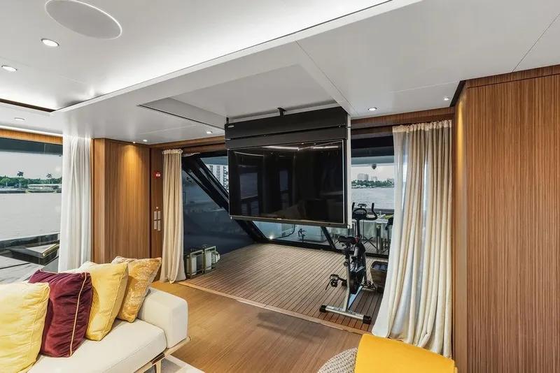 Slide: The Image of Luxurious 2018 Custom Line 120 yacht interior with modern decor and waterfront view. - 46