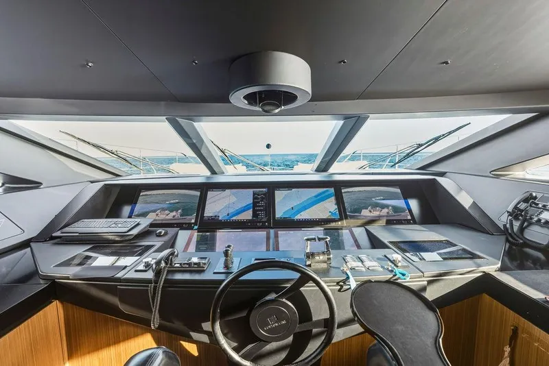 Slide: The Image of Helm of 2018 Custom Line 120 yacht with advanced navigation systems and ocean view. - 51