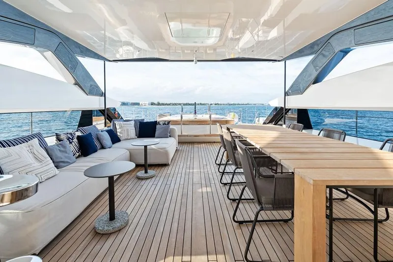 Slide: The Image of Luxurious 2018 Custom Line 120 yacht interior with elegant seating and dining area. - 55